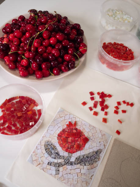 istock Red and White Aesthetics: A vertical close-up flat lay captures a mosaic workshop table in all its vibrant detail. 2154630863