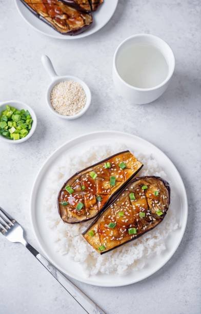 istock Teriyaki sauce eggplant slices with rice in a plate 2154633553