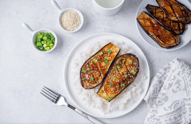 istock Teriyaki sauce eggplant slices with rice in a plate 2154633554