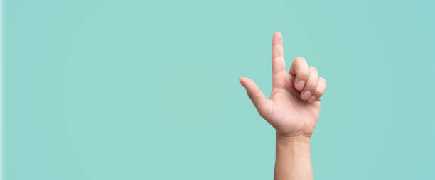 istock hand pointing finger on a white background- concept of idea or pointing to something 2154642656