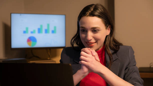 istock Young businesswoman working with laptop in office environment 2154652812