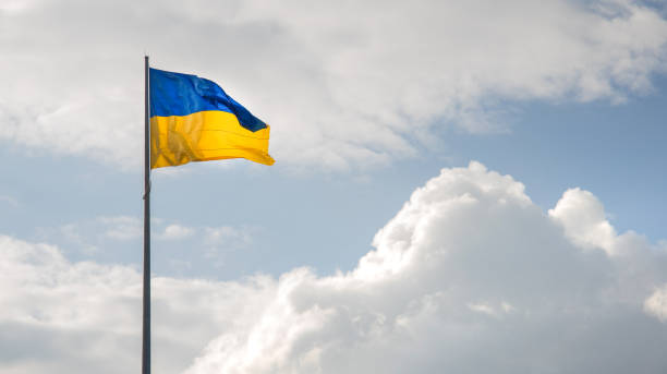 istock waving Ukrainian flag on cloudy sky background wallpaper panoramic concept picture 2154655468