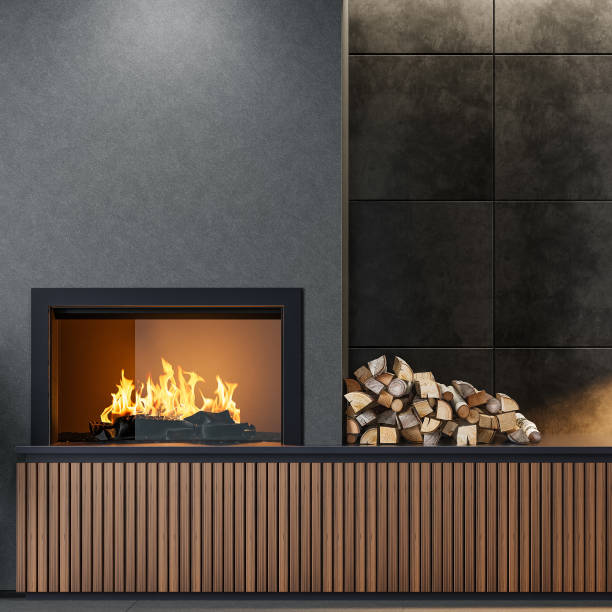 A bright, minimalist unfurished living space featuring a modern stone fireplace with a warm fire burning inside. Next to the fireplace, a basket of firewood rests on a polished wooden floor, a white plaster wall with copy space, while large windows on the right let in natural light and provide a view of greenery outside, enhancing the room’s airy and tranquil atmosphere. 3D rendered image.