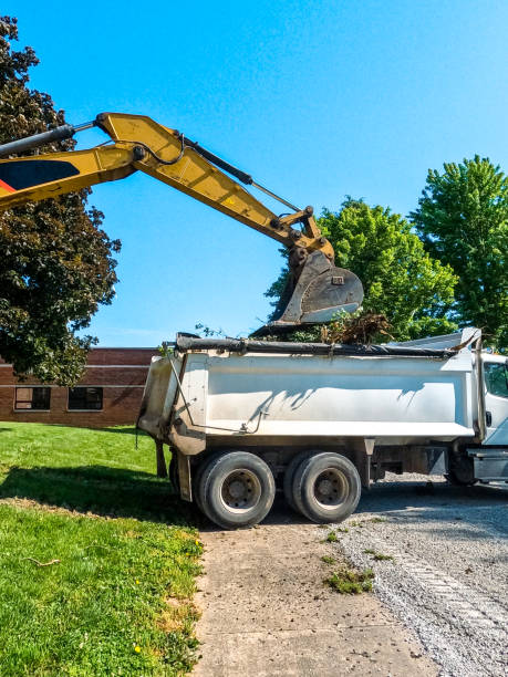 istock Hydraulic Excavator Loads a Dump Truck 2154660713