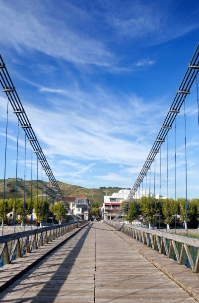 istock Europes First Wire Cable Suspension Bridge built across the Rhone between Tain L Hermitage and Tournon sur Rhone by Inventor Marc Seguin 2154663208