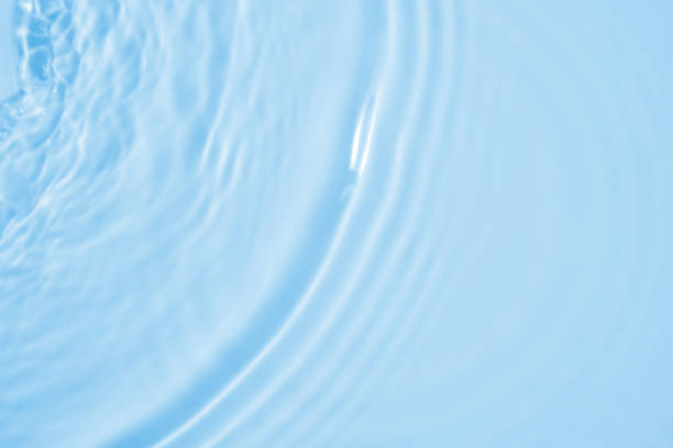 istock Abstract transparent water shadow surface texture natural ripple on blue background 2154664042