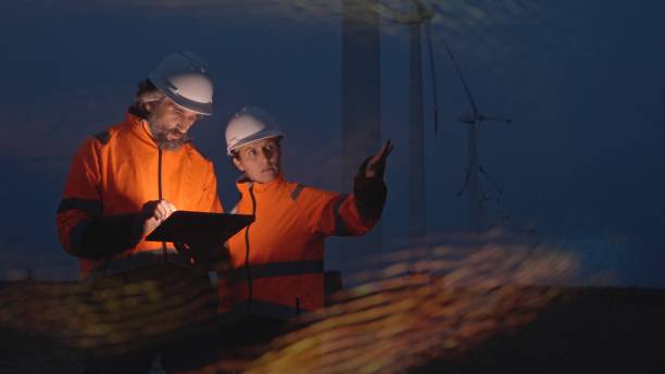 istock Smart City. Engineers Teamwork on Energy Management. Night Shift. 2154664086