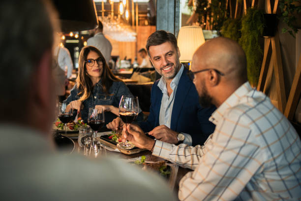 istock Multiracial business team enjoying at the restaurant 2154664098