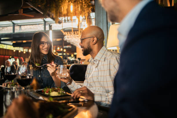 istock Business partners enjoying on a business lunch 2154664117
