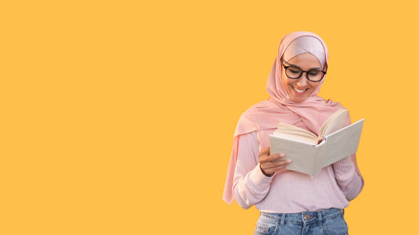 istock Book lover learning hobby smiling woman reading 2154664306