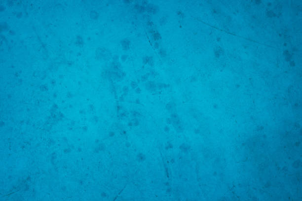 Dark blue concrete stone texture for background in summer wallpaper. Cement and sand wall of tone vintage minimal. Concrete abstract wall of light cyan color, cement texture mint green for design.