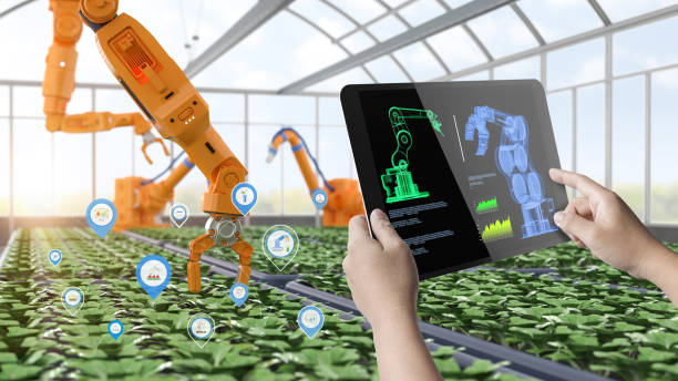 istock Agriculture technology concept with human control 3d rendering robotic arm in greenhouse 2154664537