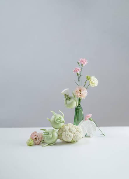istock unusual composition of flowers, vegetables and cheese 2154664653