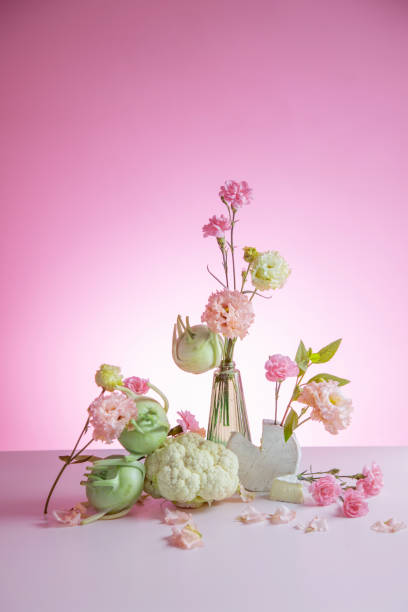 istock unusual composition of flowers, vegetables and cheese 2154664665