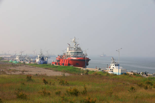 LUANNAN COUNTY, China - June 3, 2022: The ships docked at a shipyard Wharf, North China