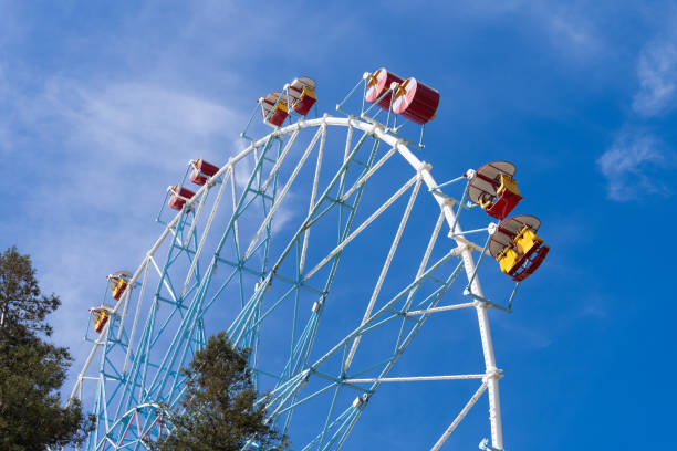 istock Ferris wheel against the blue sky. Modern Ferris wheel. 2154671339