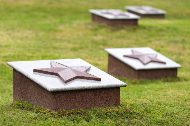 Tombstones of soldier mass graves. Military cemetery.