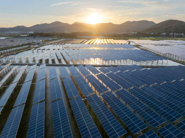 istock Solar power plant on a fish farm in the evening 2154671983