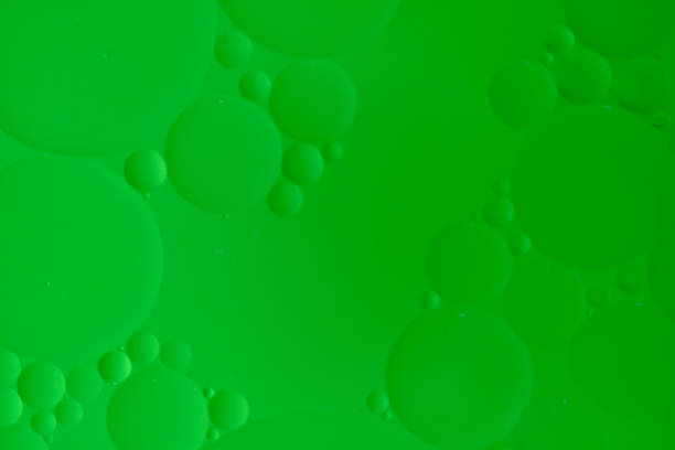 Abstract background with green oil circles and gradient.