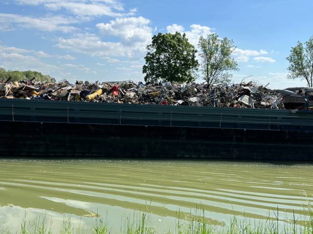 istock Ship on German river Neckar carrying scrap metal and junk 2154673863