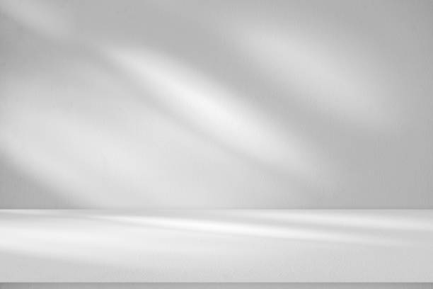 istock Wall interior background, studio and backdrops show products.with shadow from window color white . background for text insertion and presentation product 2154680136
