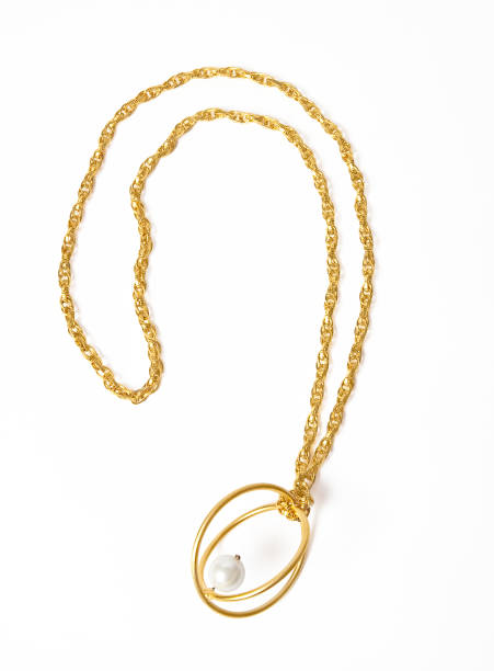 istock Gold chain with pearl necklace isolated on white background 2154681316