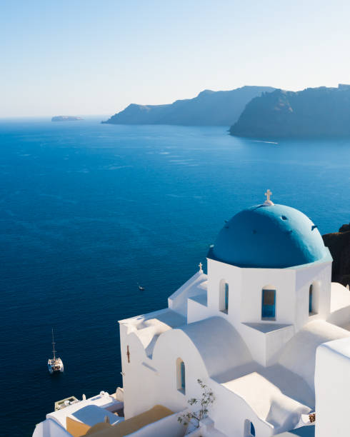 White architecture in Santorini island, Greece. Beautiful sea view at sunset.