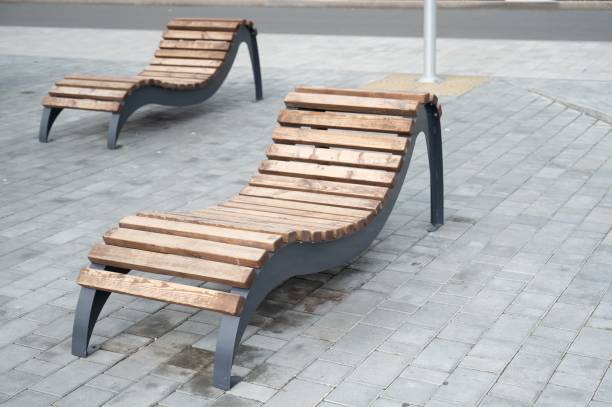 istock Public wooden benches sun loungers. 2154683407
