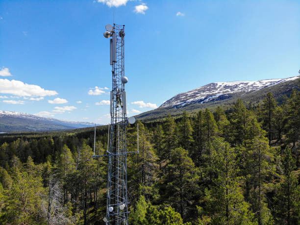 istock Working on installation of 5G telecommunications antennas with great view 2154684359