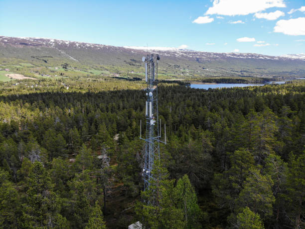 istock Working on installation of 5G telecommunications antennas with great view 2154684377