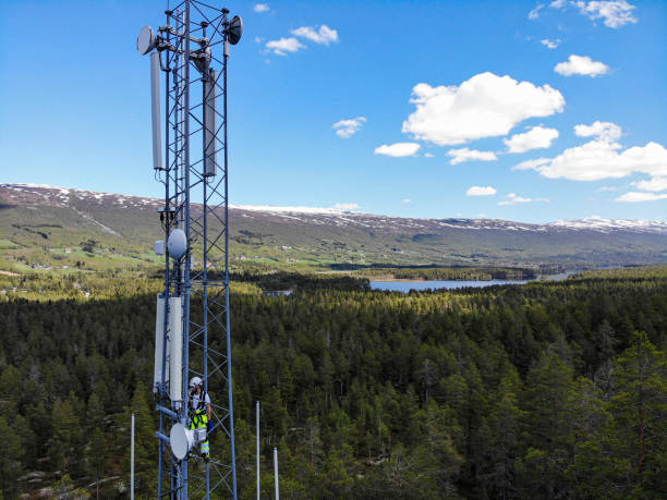 istock Working on installation of 5G telecommunications antennas with great view 2154684381