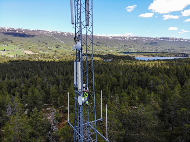 istock Working on installation of 5G telecommunications antennas with great view 2154684384