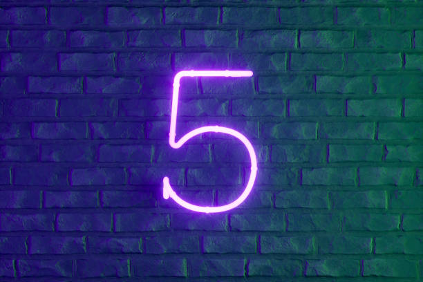 Number 5 with glowing neon lighting on black brick wall. Digitally generated image. 3d render.