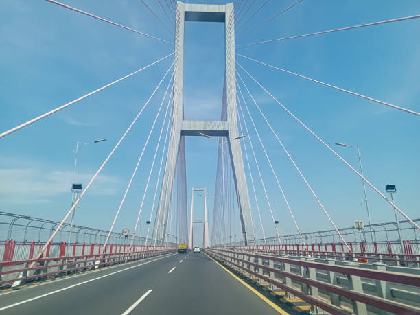 istock Point of view driving around suramadu bridge 2154685986