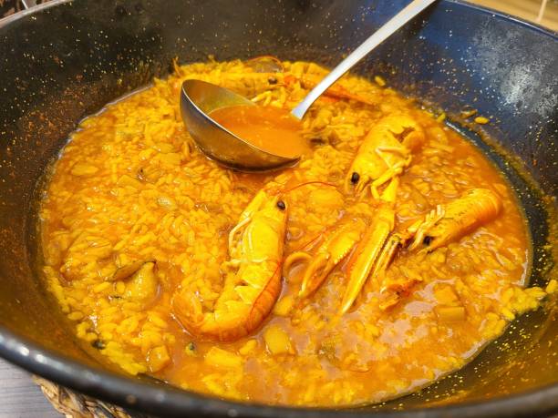 istock Valencia paella with seafood closeup 2154690420