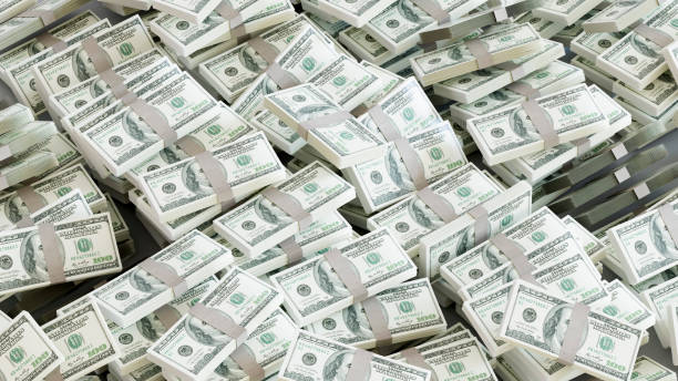 istock Stack of US dollars banknotes, one hundred dollar bills 2154692456