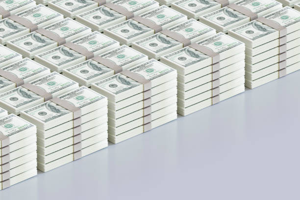 istock Stack of US dollars banknotes, one hundred dollar bills 2154692577