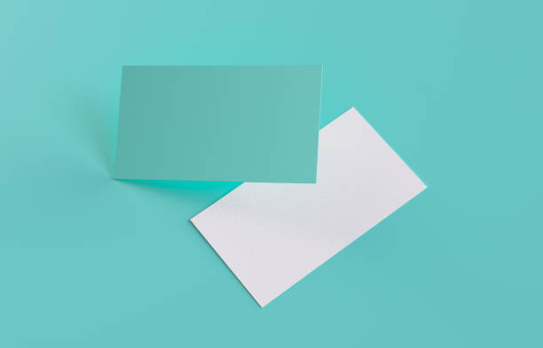 istock Two Blank business cards template on green background 2154694688