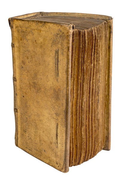 istock Very old book in leather isolated on white 2154697540