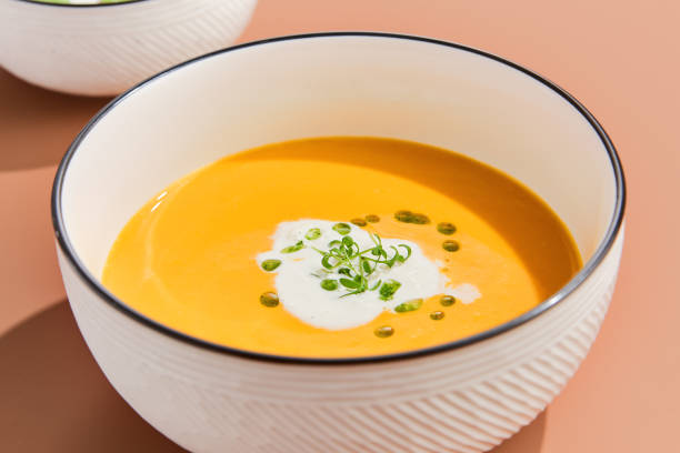 istock Pumpkin Cream Soup with Coconut Milk Garnished with Microgreens 2154700251
