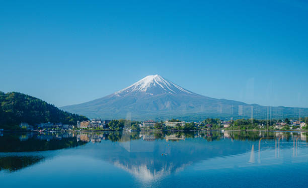 istock Beautiful Mt. Fuji reflected in Lake Kawaguchi 2154702190