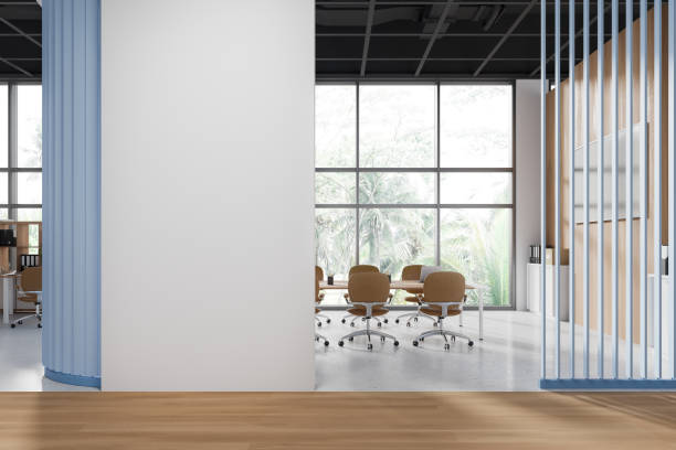 istock Stylish meeting room interior with board, tv screen and window. Mock up wall 2154703104