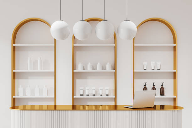 istock White sale interior reception desk, laptop and shelf with cosmetics 2154703194