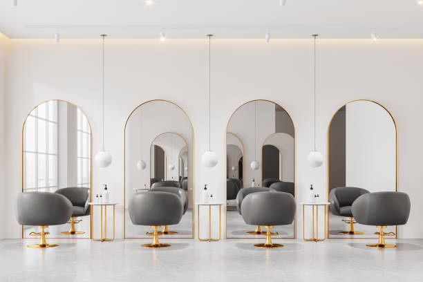 istock Stylish modern beauty salon interior with armchairs, cosmetics on table 2154704167