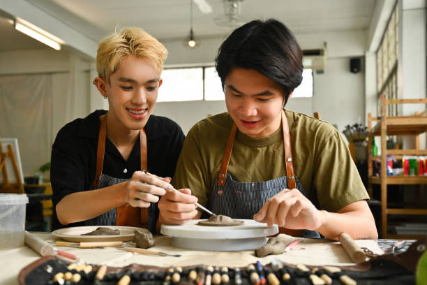 istock An artist teaches a student the art of pottery, guiding hands-on techniques in a creative studio. The collaborative spirit of art education, emphasizing skill development and mentorship 2154704974