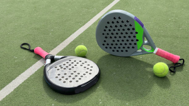 istock Paddle tennis objects on grass court 2154707150
