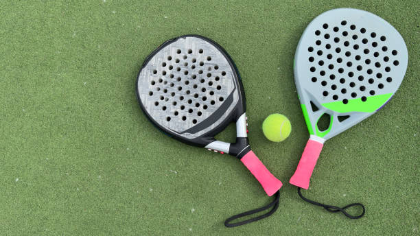 istock paddle rackets on the playing court 2154707181