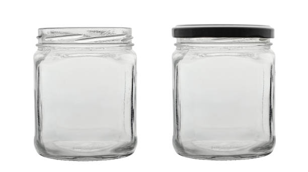 istock Two transparent empty jars, without a lid and with a lid, for conservation. Isolated on a white background. 2154710705