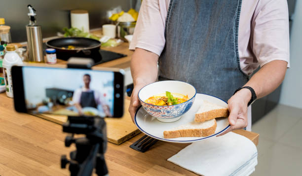 istock The chef is broadcasting live from workshop how to prepare a vegetarian food 2154712613