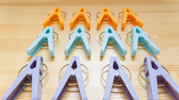 istock Colorful clothespins placed on the table 2154714125